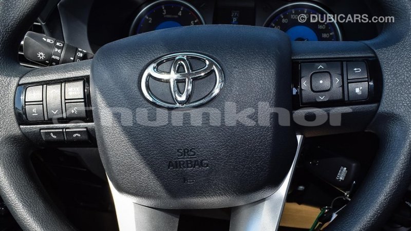 Big with watermark toyota hilux bumthang import dubai 2969