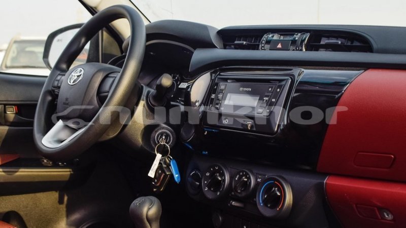 Big with watermark toyota hilux bumthang import dubai 2971