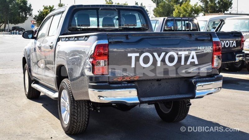 Big with watermark toyota hilux bumthang import dubai 2979