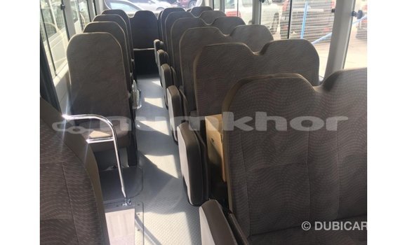 Buy Import Toyota Coaster White Car in Import - Dubai in Bumthang Buy Import Toyota Coaster White Car in Import - Dubai in Bumthang