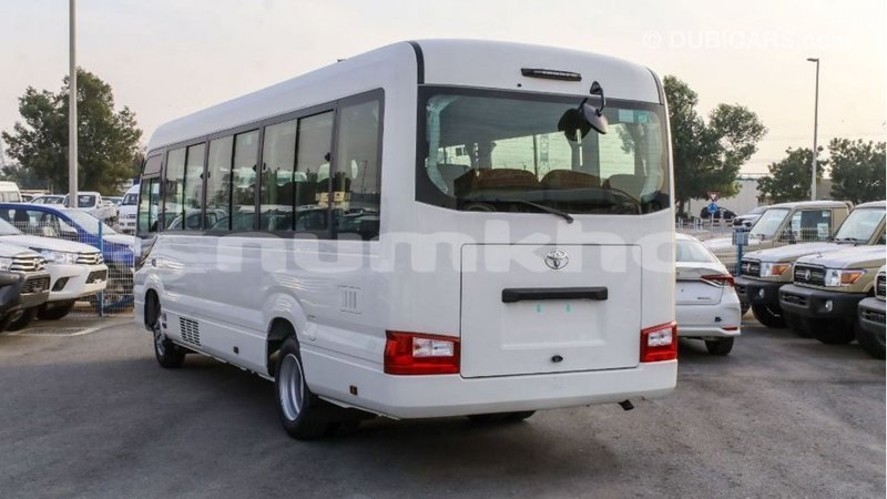 Big with watermark toyota coaster bumthang import dubai 2989
