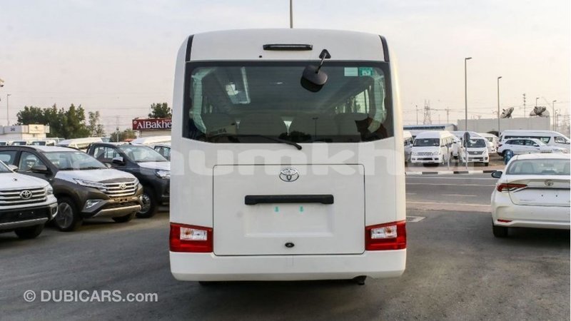 Big with watermark toyota coaster bumthang import dubai 2989