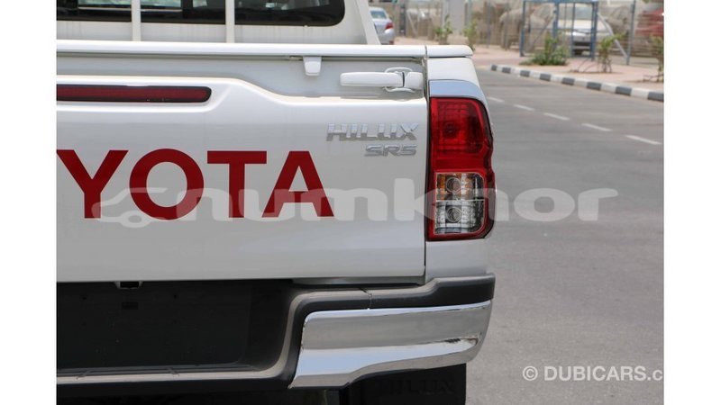 Big with watermark toyota hilux bumthang import dubai 3001