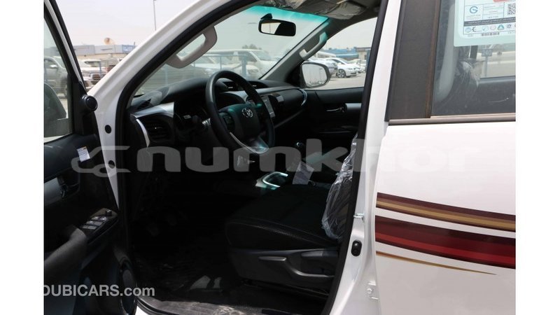 Big with watermark toyota hilux bumthang import dubai 3001