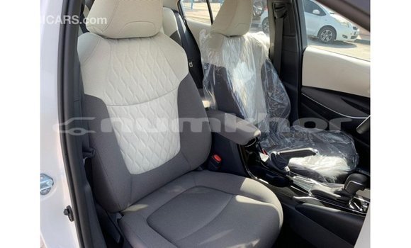 Buy Import Toyota Corolla White Car in Import - Dubai in Bumthang Buy Import Toyota Corolla White Car in Import - Dubai in Bumthang