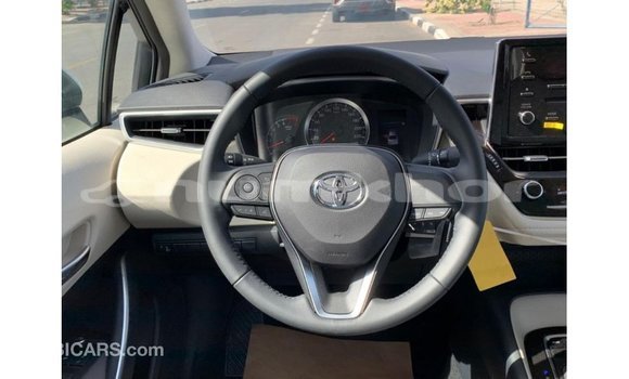 Buy Import Toyota Corolla White Car in Import - Dubai in Bumthang Buy Import Toyota Corolla White Car in Import - Dubai in Bumthang