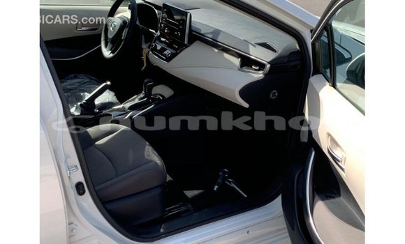 Buy Import Toyota Corolla White Car in Import - Dubai in Bumthang Buy Import Toyota Corolla White Car in Import - Dubai in Bumthang