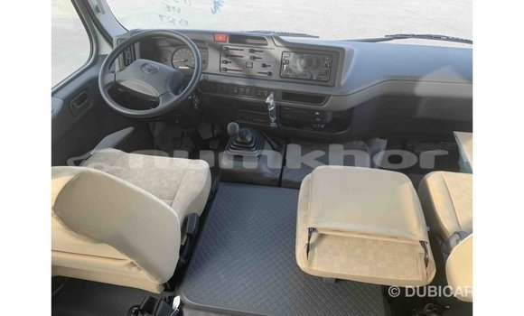 Buy Import Toyota Coaster White Car in Import - Dubai in Bumthang Buy Import Toyota Coaster White Car in Import - Dubai in Bumthang