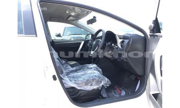 Buy Import Toyota Corolla White Car in Import - Dubai in Bumthang Buy Import Toyota Corolla White Car in Import - Dubai in Bumthang