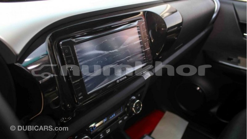 Big with watermark toyota hilux bumthang import dubai 3138