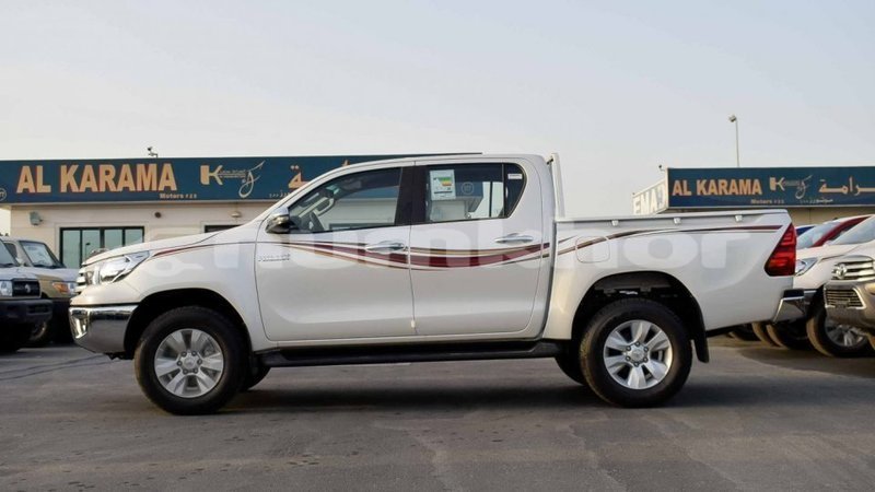 Big with watermark toyota hilux bumthang import dubai 3151