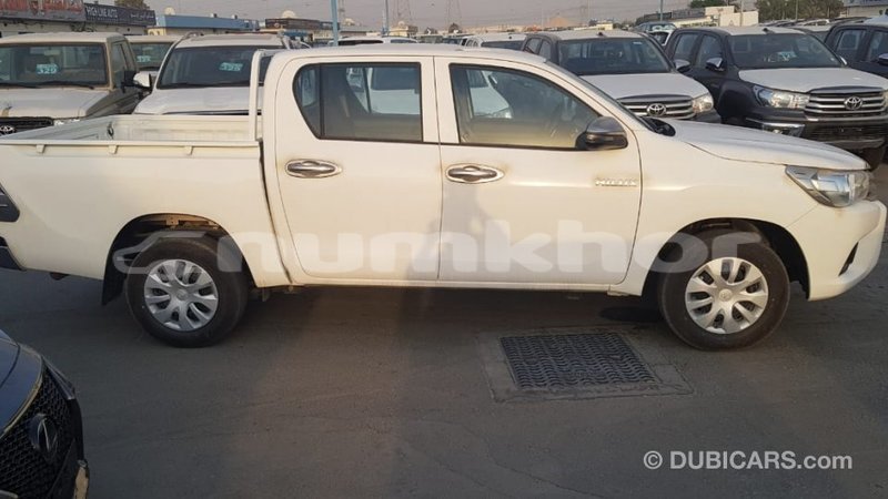 Big with watermark toyota hilux bumthang import dubai 3164