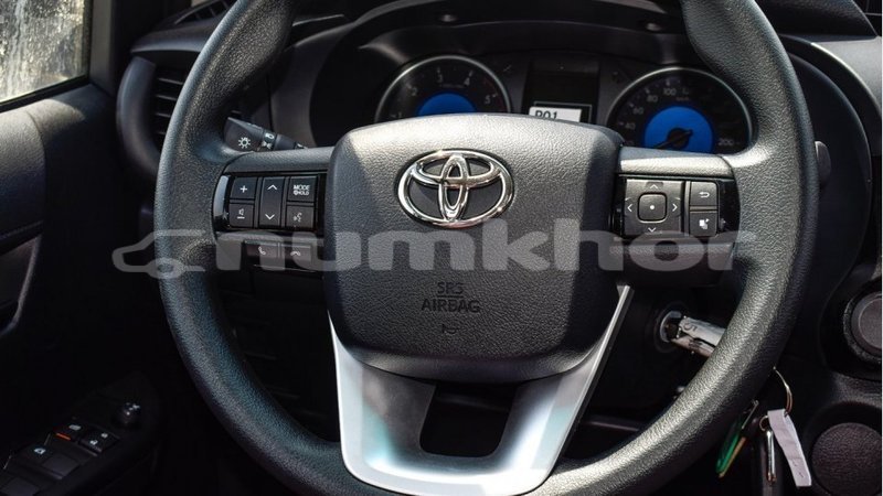 Big with watermark toyota hilux bumthang import dubai 3169