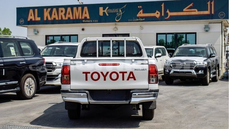 Big with watermark toyota hilux bumthang import dubai 3169