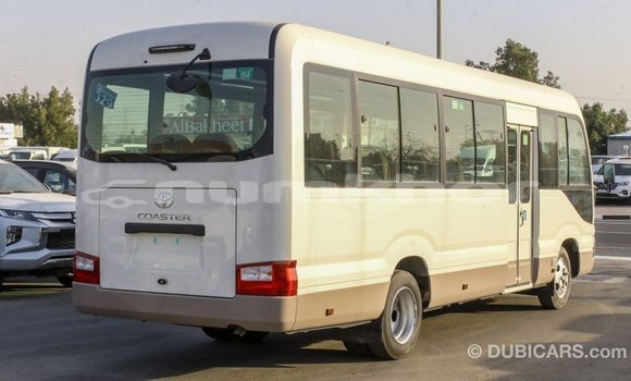 Buy Import Toyota Coaster White Car in Import - Dubai in Bumthang Buy Import Toyota Coaster White Car in Import - Dubai in Bumthang