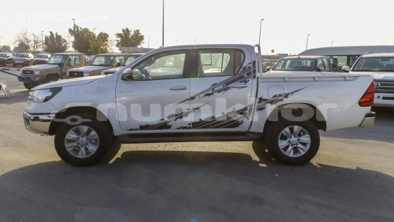 Big with watermark toyota hilux bumthang import dubai 3254