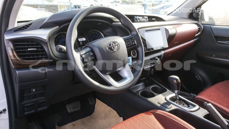 Big with watermark toyota hilux bumthang import dubai 3261