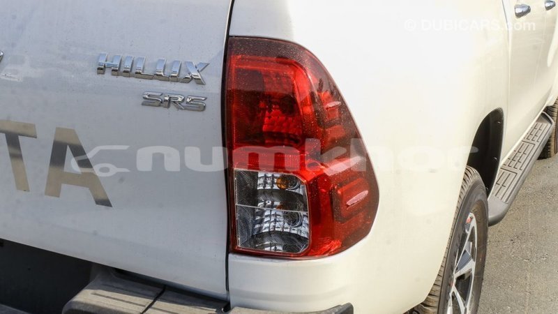 Big with watermark toyota hilux bumthang import dubai 3261