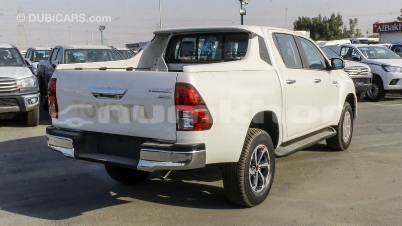 Big with watermark toyota hilux bumthang import dubai 3261