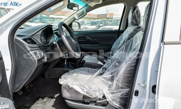 Buy Import Mitsubishi L200 White Car in Import - Dubai in Bumthang Buy Import Mitsubishi L200 White Car in Import - Dubai in Bumthang