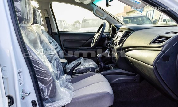 Buy Import Mitsubishi L200 White Car in Import - Dubai in Bumthang Buy Import Mitsubishi L200 White Car in Import - Dubai in Bumthang