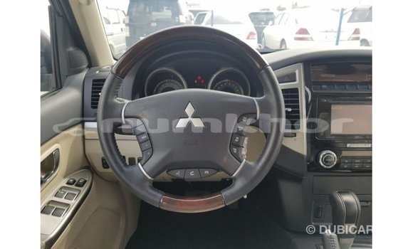 Buy Import Mitsubishi Pajero Red Car in Import - Dubai in Bumthang Buy Import Mitsubishi Pajero Red Car in Import - Dubai in Bumthang