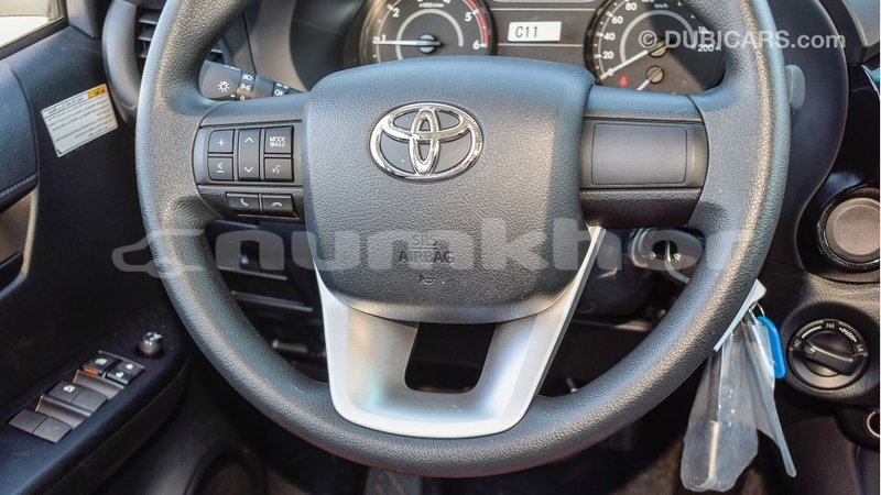 Big with watermark toyota hilux bumthang import dubai 3472