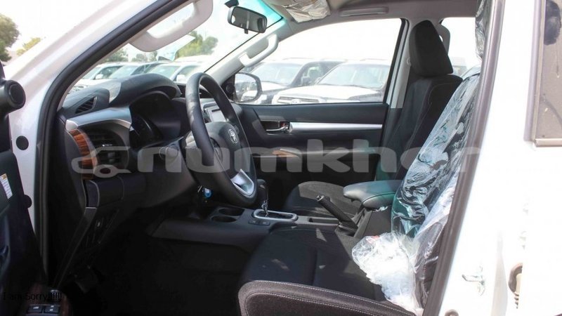 Big with watermark toyota hilux bumthang import dubai 3483