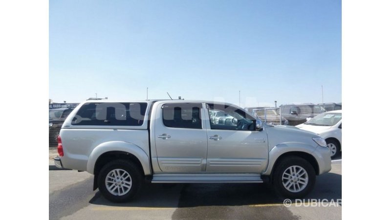 Big with watermark toyota hilux bumthang import dubai 3486
