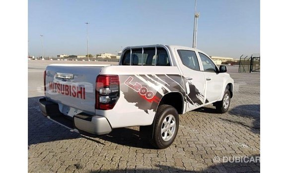 Buy Import Mitsubishi L200 White Car in Import - Dubai in Bumthang Buy Import Mitsubishi L200 White Car in Import - Dubai in Bumthang