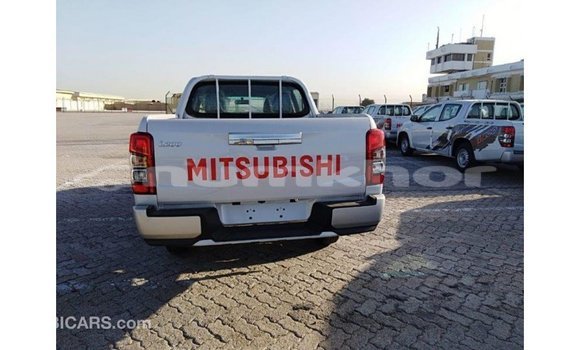 Buy Import Mitsubishi L200 White Car in Import - Dubai in Bumthang Buy Import Mitsubishi L200 White Car in Import - Dubai in Bumthang
