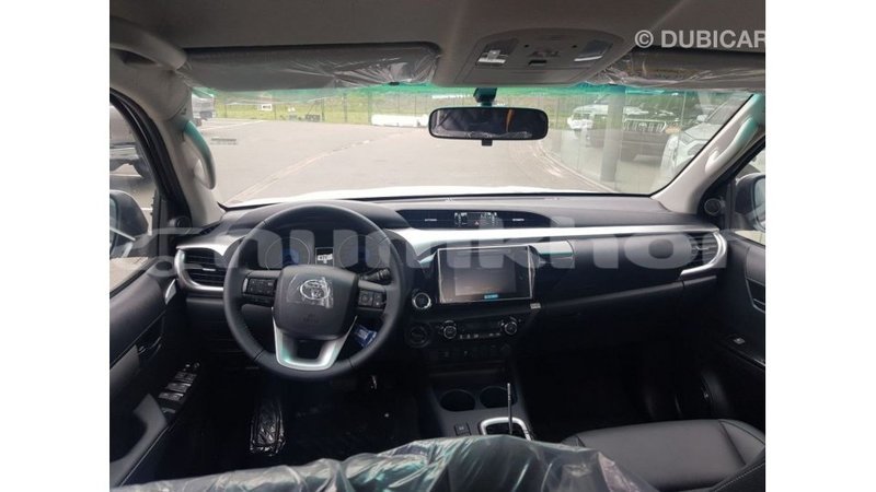 Big with watermark toyota hilux bumthang import dubai 3557