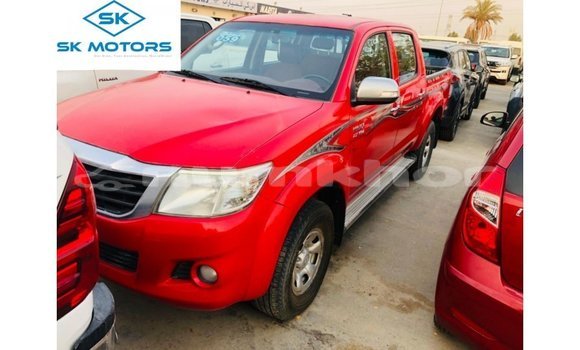Buy Import Toyota Hilux Red Car in Import - Dubai in Bumthang