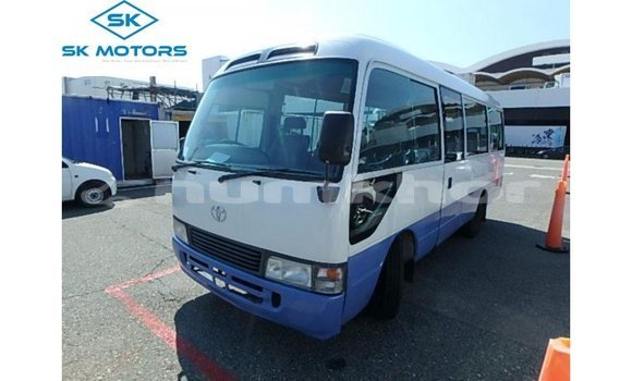 Buy Import Toyota Coaster White Car in Import - Dubai in Bumthang