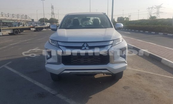 Buy Import Mitsubishi L200 White Car in Import - Dubai in Bumthang