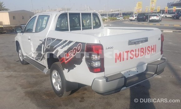 Buy Import Mitsubishi L200 White Car in Import - Dubai in Bumthang Buy Import Mitsubishi L200 White Car in Import - Dubai in Bumthang