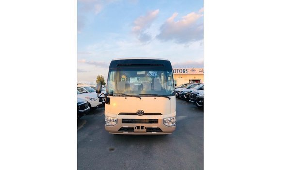 Buy Import Toyota Coaster White Car in Import - Dubai in Bumthang