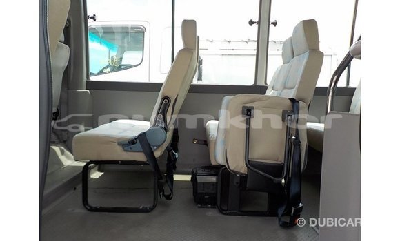 Buy Import Toyota Coaster White Car in Import - Dubai in Bumthang Buy Import Toyota Coaster White Car in Import - Dubai in Bumthang
