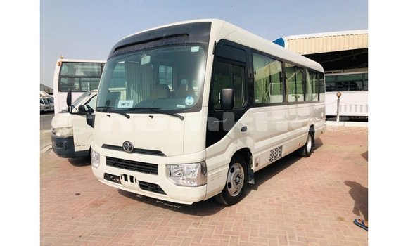 Buy Import Toyota Coaster White Car in Import - Dubai in Bumthang
