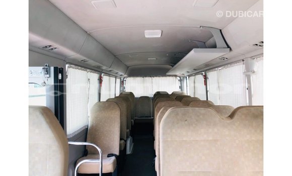 Buy Import Toyota Coaster White Car in Import - Dubai in Bumthang Buy Import Toyota Coaster White Car in Import - Dubai in Bumthang