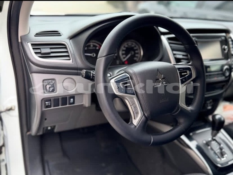 Big with watermark mitsubishi l200 timphu thimphu 4934