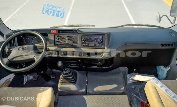 Buy Import Toyota Coaster White Car in Import - Dubai in Bumthang Buy Import Toyota Coaster White Car in Import - Dubai in Bumthang